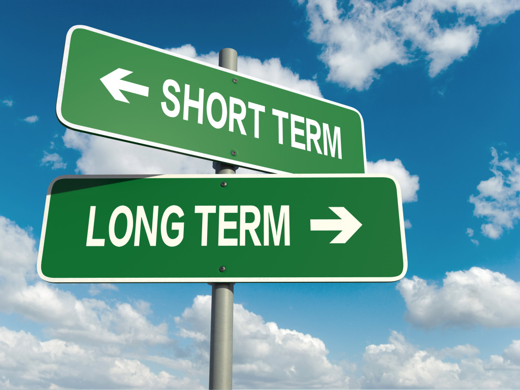 SHORT TERM and LONG TERM arrow signs pointing in opposite directions